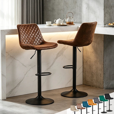 Two brown adjustable swivel bar stools at a kitchen island