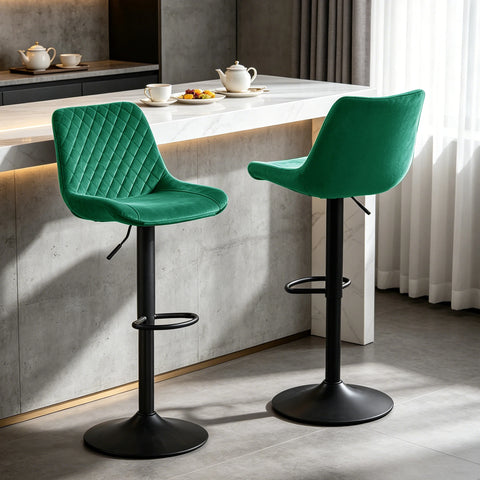 Two green velvet adjustable swivel bar stools at a breakfast bar