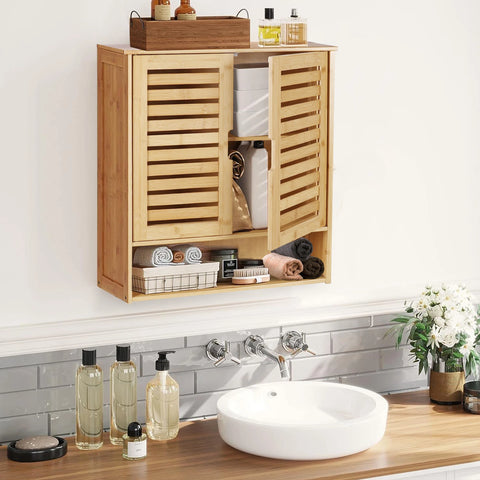 Bamboo bathroom wall cabinet above a basin with toiletries on top