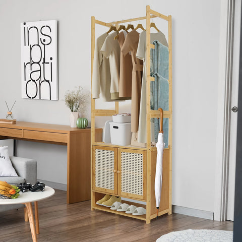 Bamboo clothes stand with cabinet beside a desk