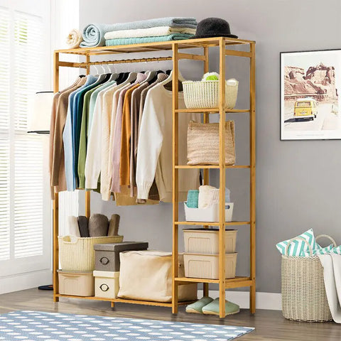 Bamboo garment rack with curtain beside a window