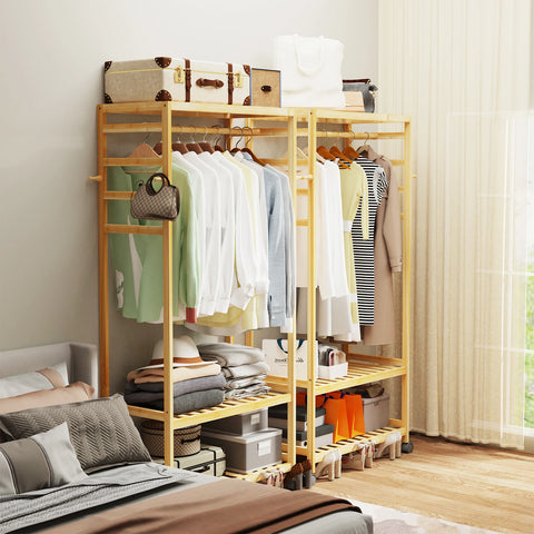Bamboo clothes rail with hanging clothes and a lower shelf
