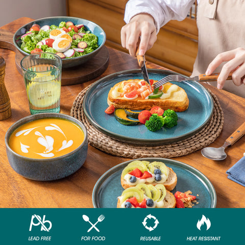 Teal reactive glaze plate and bowl served with a meal