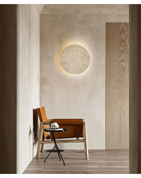 Cave stone wall light above a desk and chair