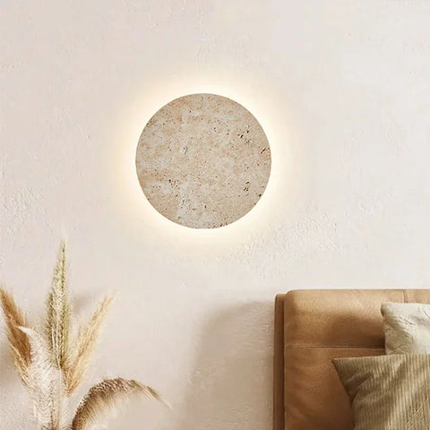 Cave stone wall light beside dried pampas grass
