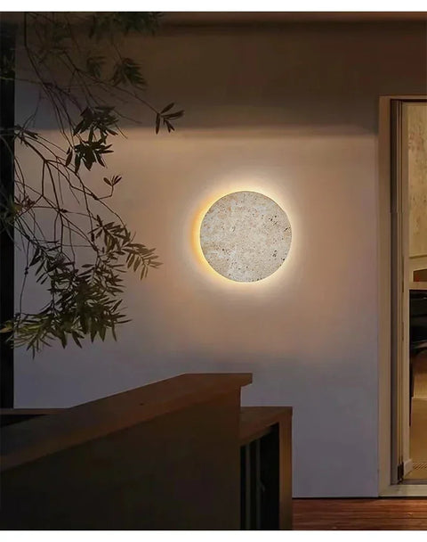 Cave stone wall light glowing on a stairway wall