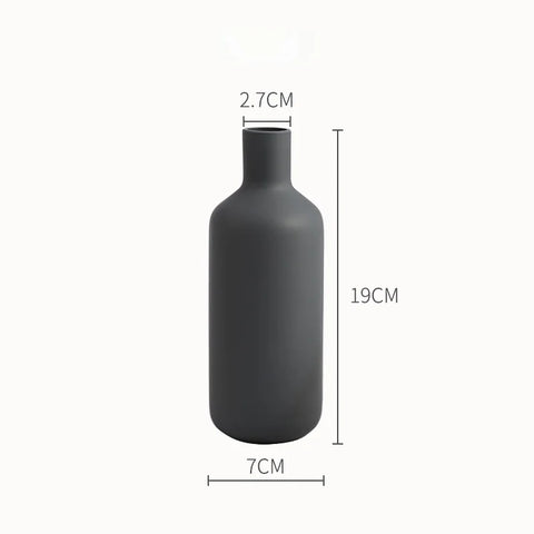 Bottle shape ceramic table vase — 19 cm high, 7 cm base