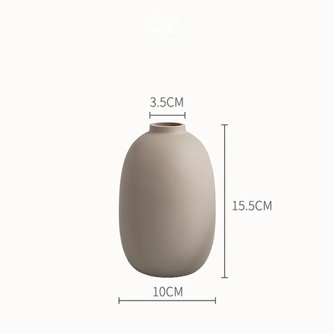 Wide shape ceramic table vase — 15.5 cm high, 10 cm wide
