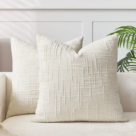 Cream chenille cushion cover on a sofa