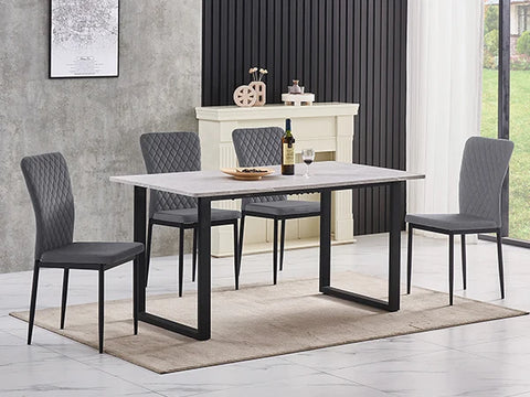 Grey chrome leg dining chairs at a rectangular dining table