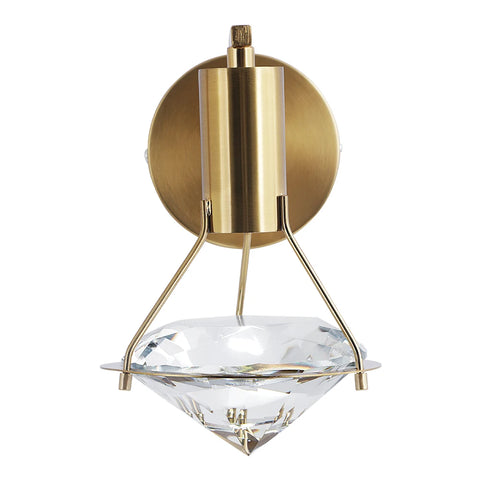 Copper and crystal wall light shown against a white wall