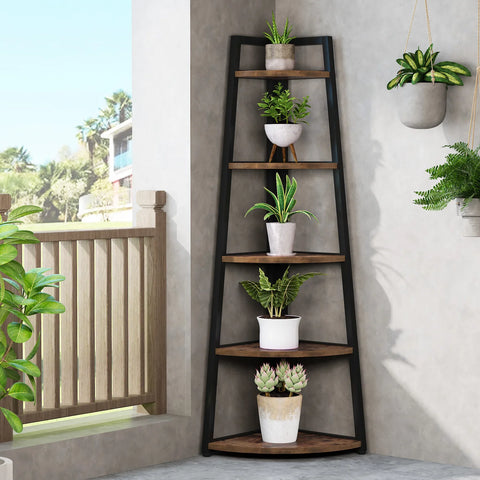 Corner ladder shelf on a balcony holding plants