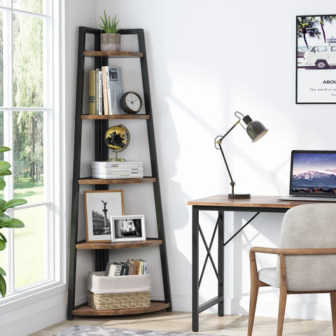 Corner ladder bookcase beside a desk