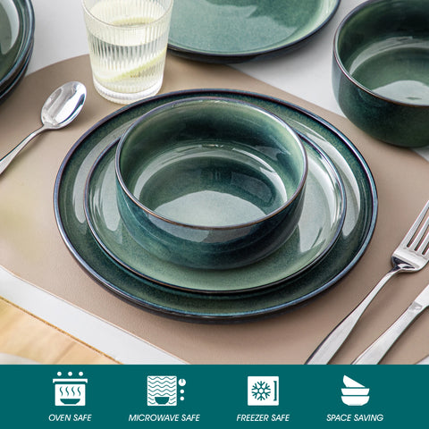 Close view of stacked curved edge green bowls and plates