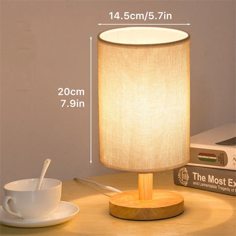 Cylinder bedside lamp, 14.5cm wide and 20cm tall