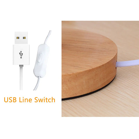 The lamp's USB cable with an inline switch, and its wooden base