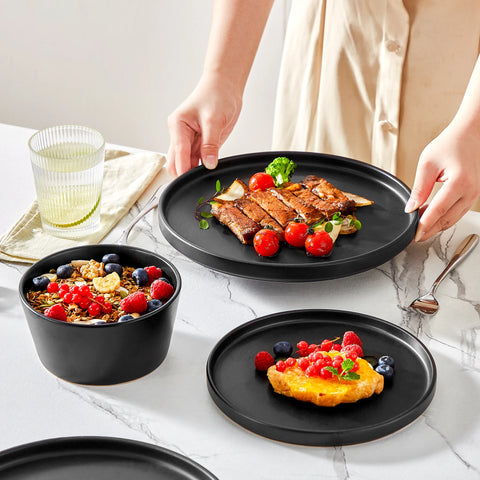 Black reactive glaze plates served with food