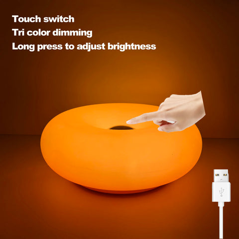 Donut table lamp in orange, touch switch with three-colour dimming and USB cable