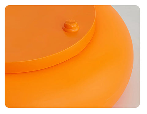 Close-up of the donut lamp's touch control in the centre
