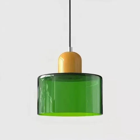 Emerald glass pendant light with a mustard cap