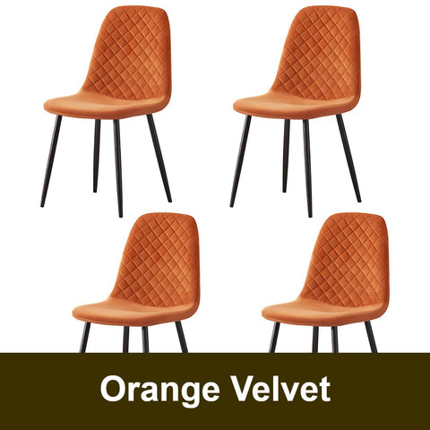 Orange velvet dining chair with black legs