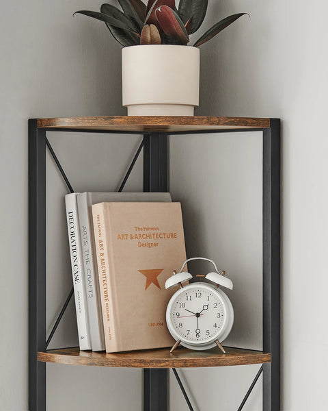 Corner shelf styled with books, a clock and a small plant