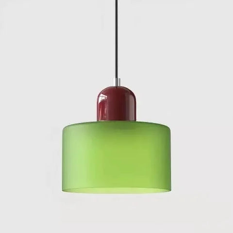 Frosted lime glass pendant light with an oxblood cap