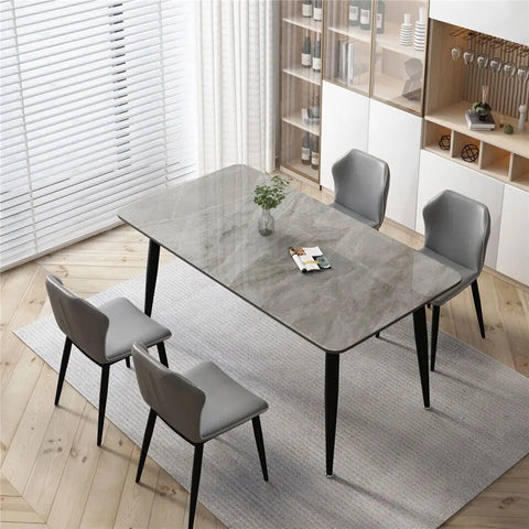 Grey gloss marble dining table with chairs in a dining room