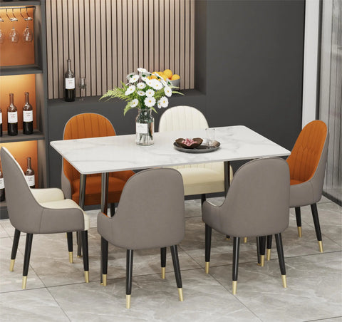 White gloss marble dining table in an open-plan room