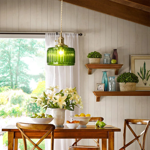 Green ribbed glass pendant light with a brass fitting