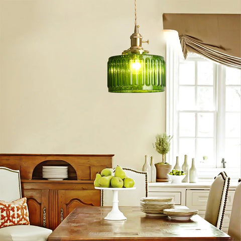 Green glass pendant lights in a kitchen