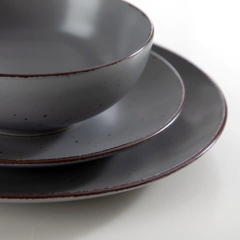 Grey stoneware plate and bowl, close view