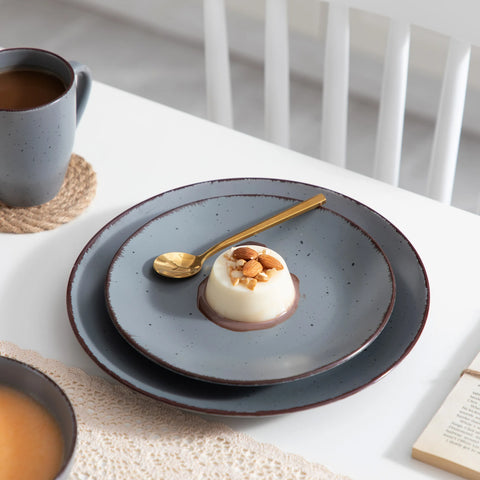 Grey stoneware plate with a dessert