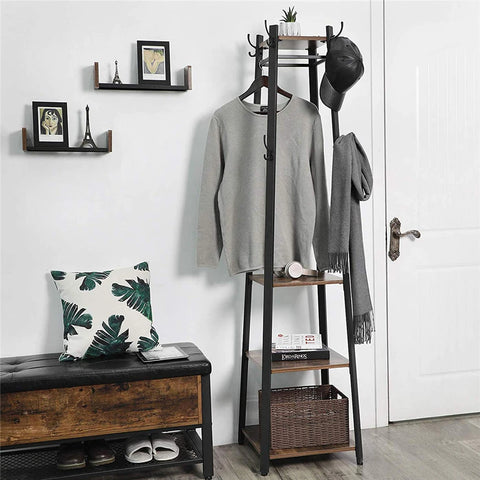Iron coat stand hung with coats above a wooden bench