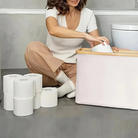 Filling a lidded storage basket with toilet rolls