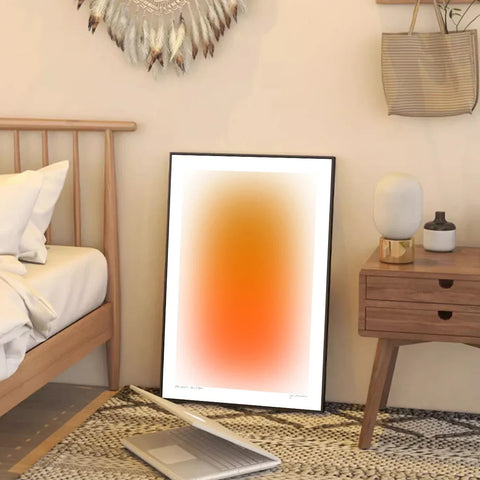 Modern gradient art print shown in a room setting