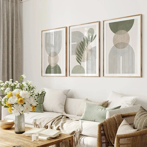 Nordic geometric leaf prints framed above a white sofa with cushions
