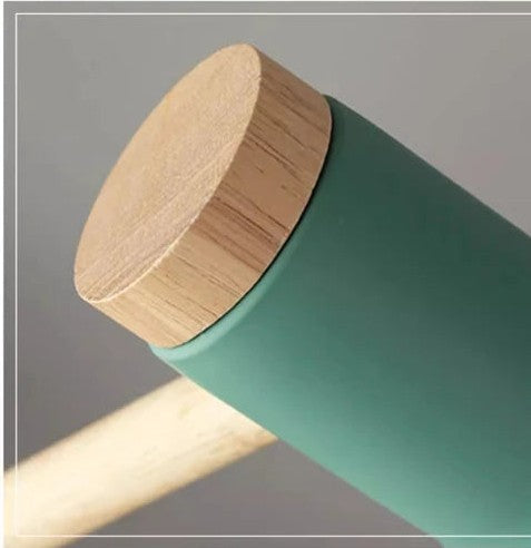 Close-up of the desk lamp's metal shade and wooden arm