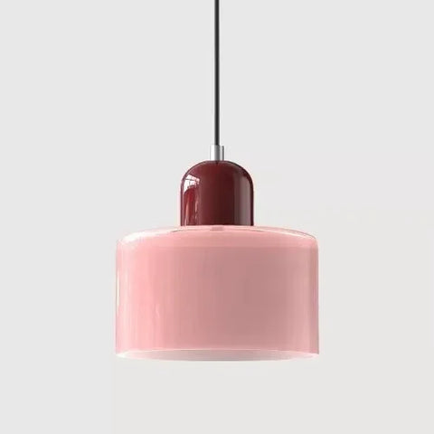 Pink glass pendant light with an oxblood cap
