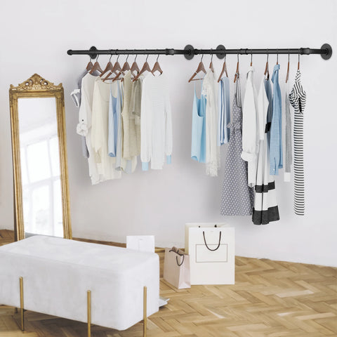 Pipe clothes rail beside a full-length mirror and bench