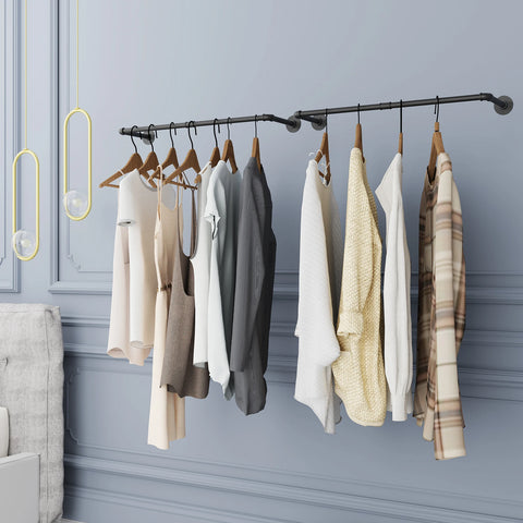 Pipe clothes rail holding neutral clothes and bags