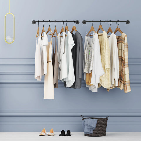 Wall-mounted pipe clothes rail with shirts and shoes below