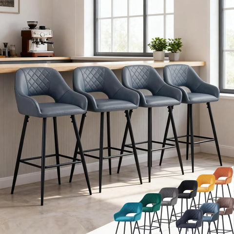 Blue-grey quilted bar stools with arms at a kitchen counter, with the colour range below