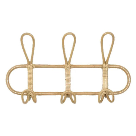 Rattan wall hook rack mounted on a plain wall
