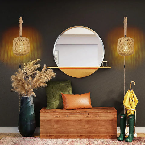 Pair of rattan wall lamps either side of a round mirror