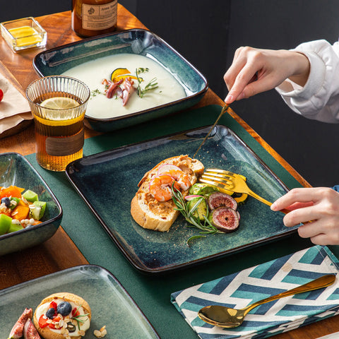 Serving food onto a square green gradient glaze plate