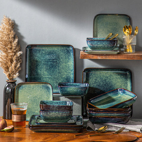 Stacked green gradient glaze plates and bowls