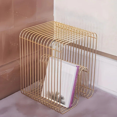 Gold wire side table, close view of the looped steel frame