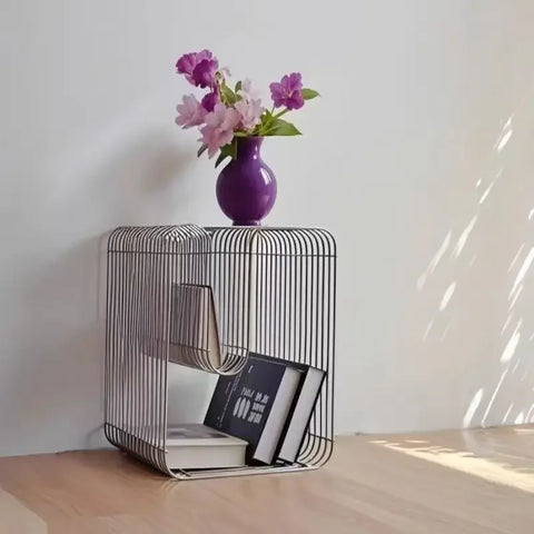 Silver wire side table with flowers and books
