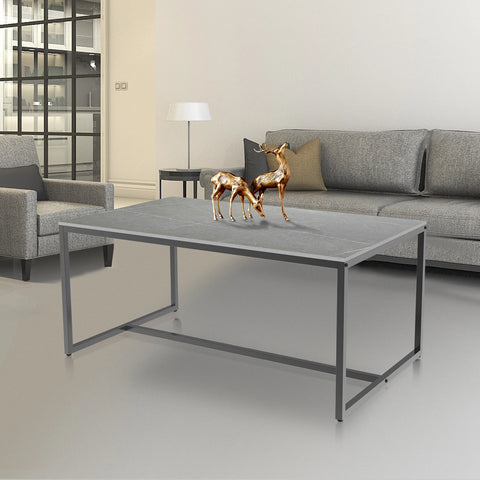 Stone and metal coffee table in a bright living room